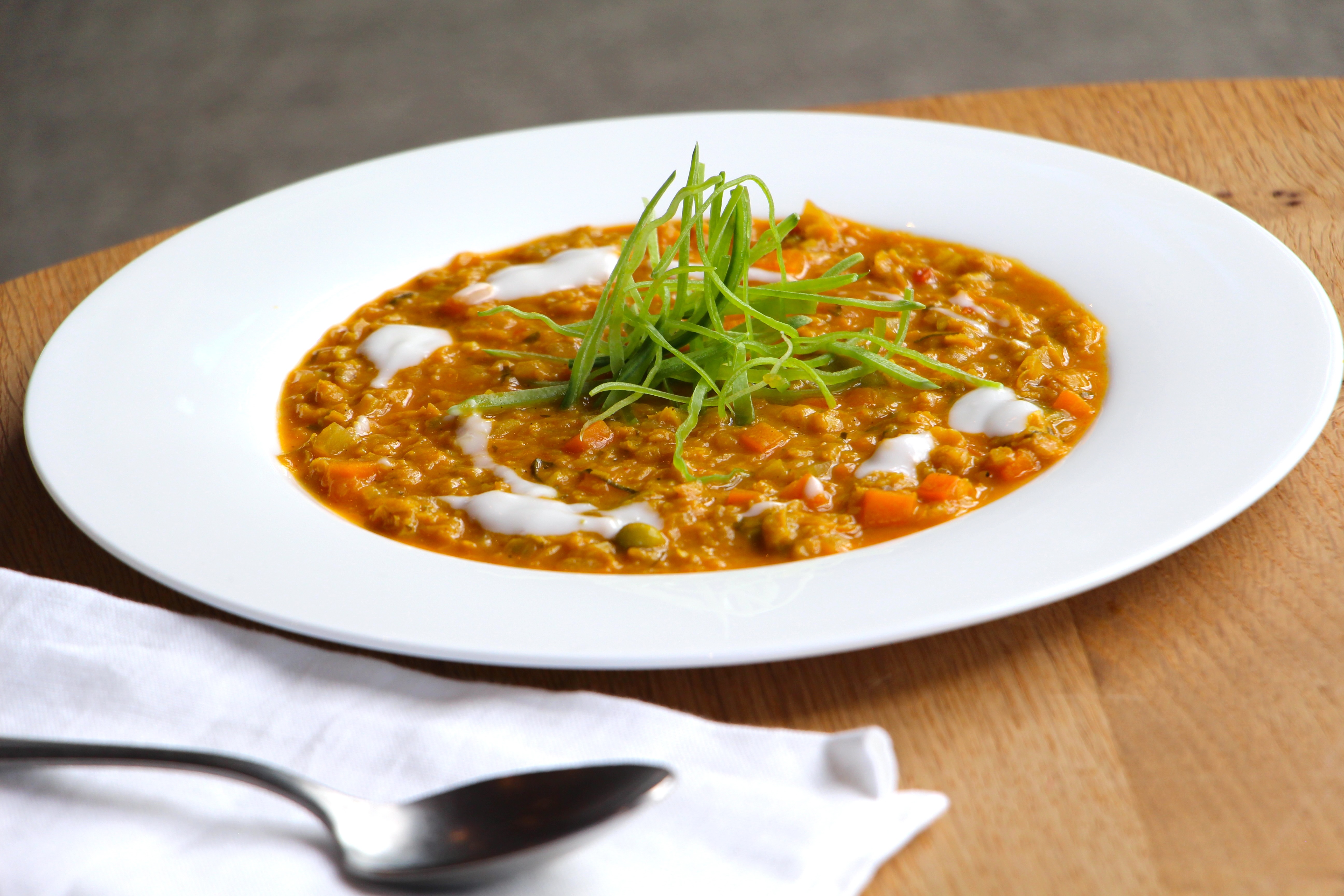Seasonal red lentil dahl, plated for a London private dining engagement