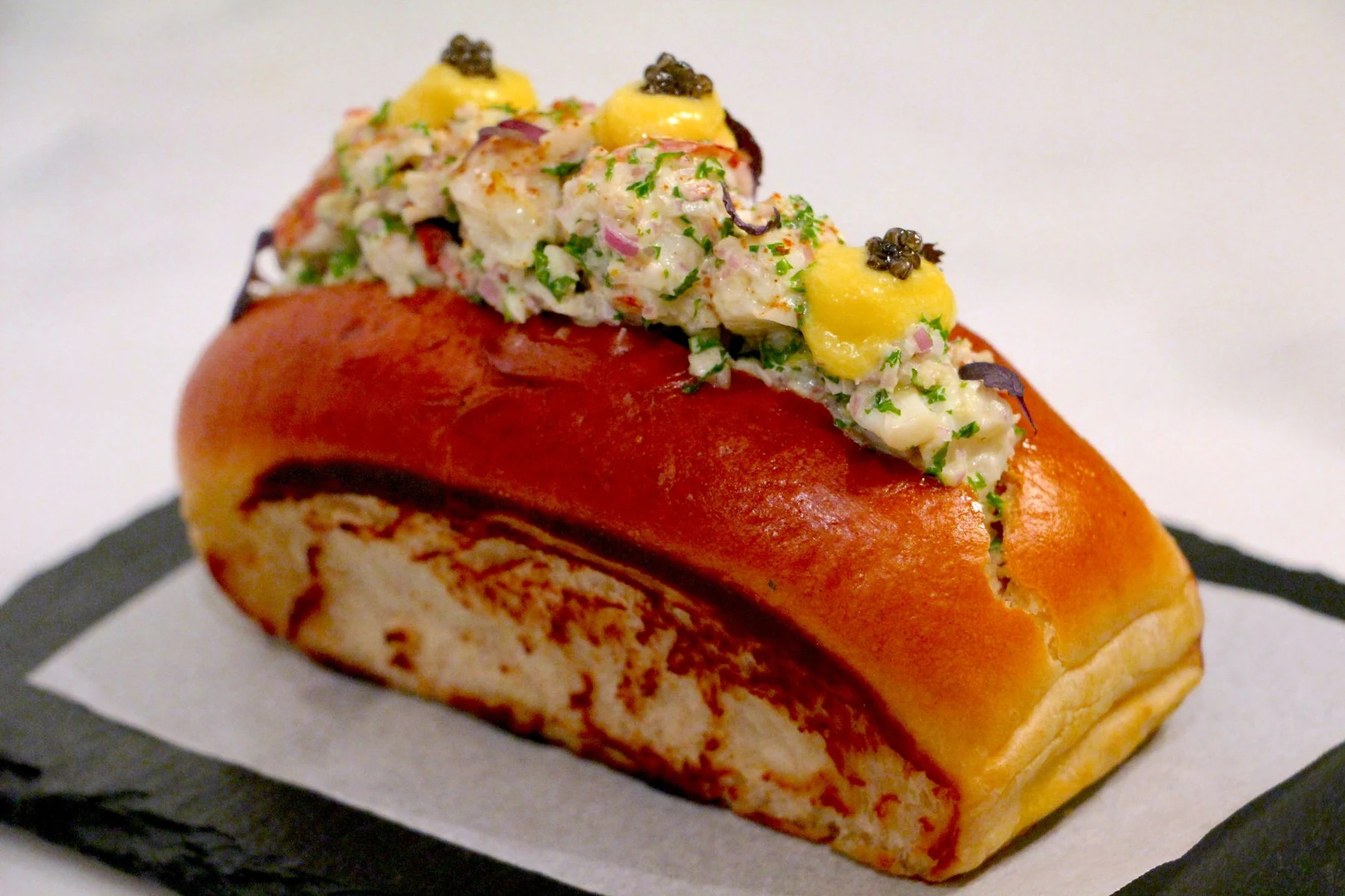 Lobster brioche roll with mango and caviar — God Save The Chef